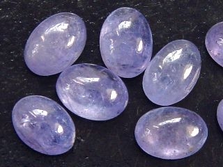Tanzanite 7 x 5 mm oval cabochon - fine blue violet