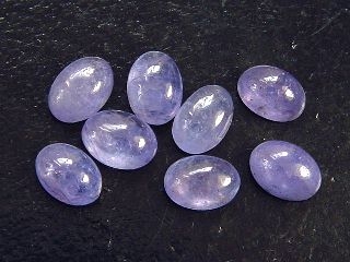 Tanzanite 7 x 5 mm oval cabochon - fine blue violet