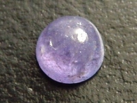 Tanzanite - 1,27 Ct. - round cabochon 6 mm