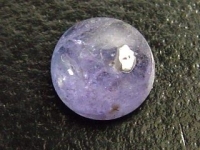 Tanzanite - 1,74 Ct. - round cabochon 7 mm