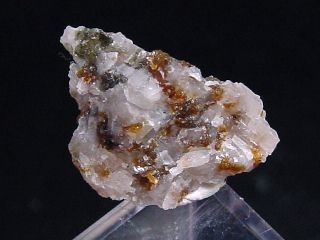 Norbergite specimen 16 mm - brown spots - Karelia Russia