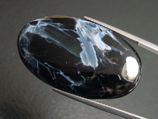 Pietersite 37,93 Ct. oval cabochon Namibia