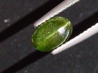 Kornerupine cat's eye 1,62 Ct. oval cabochon Sri Lanka