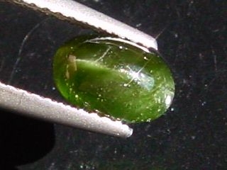 Kornerupine cat's eye 1,62 Ct. oval cabochon Sri Lanka