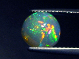 Preview: Opal / Edelopal 2,04 Ct. feinste Qualität - 9 mm Rund Cabochon Preview: Opal / Edelopal 2,04 Ct. feinste Qualität - 9 mm Rund Cabochon