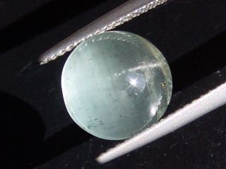 Aquamarine 5,86 Ct. - bright cat's eye - round cabochon