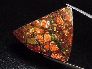 Ammolite 35,15 Ct. multicolor - fancy cabochon 34 mm