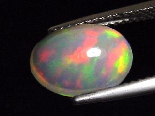Opal 2,16 Ct. - finest colorplay - oval cabochon