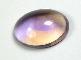 Ametrine 7,18 Ct. violet & yellow oval cabochon