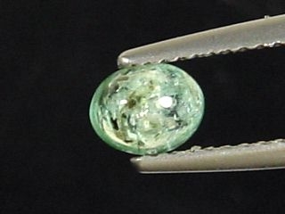 Green Chrysoberyl 5,5 mm oval cabochon Brazil