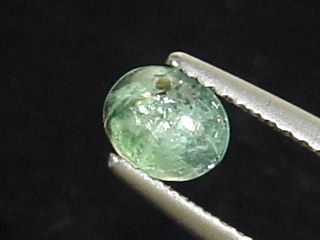 Green Chrysoberyl 6 mm oval cabochon Brazil