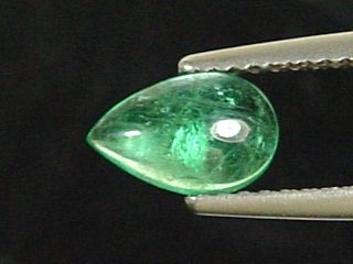 Emerald 0,76 Ct. fine green - pear cabochon Colombia