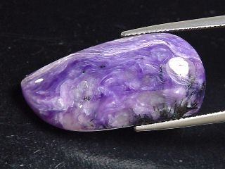 Charoite 23,77 Ct. fine fancy cabochon - Jakutia, Russia