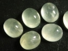 Prehnite 12 x 10 mm - oval cabochon - pastel green