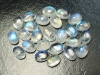 Rainbow Moonstone 7 x 5 mm - oval cabochon