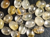 Rutile Quartz 8 x 6 mm - golden needles - oval cabochon