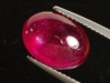Ruby 6,08 Ct. oval cabochon - fine red - treated