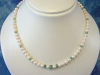 Akoya Pearl necklace with 10,20 Ct. faceted Emerald (63k)
