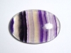 Fluorite 95,35 Ct. multicolor banded oval cabochon