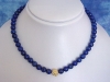 Lapislazuli necklace 207,70 Ct. with fine golden Ammonite