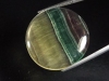 Fluorite 48,21 Ct. multicolor banded oval cabochon