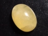 Calcite 24,55 Ct. yellow - oval cabochon - Brazil