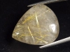 Rutile Quartz 23,49 Ct. fine golden needles pear cabochon