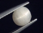 Preview: Beryllonit Katzenauge 0,93 Ct. selten Rund Cabochon Linopolis, Brasilien