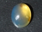 Preview: Blauer Bernstein 11,52 Ct. - 21,5 mm Oval Cabochon Dom. Rep.