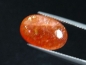 Preview: Sunstone 6,89 Ct. oval cabochon 16 x 11 mm Sri Lanka