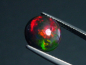Preview: Black Opal 2,85 Ct. treated - round cabochon