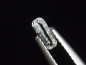 Preview: Natrolit 0,17 Ct. 6 mm Baguette geschliffen - Skardu, Gilgit, Pak.