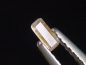 Preview: Kassiterite 0,14 Ct. 4 mm baguette faceted - Böhmen, Czech Rep.
