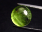 Preview: Peridot 8,75 Ct. applegreen round cabochon