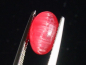 Preview: Rhodonit Katzenauge 2,45 Ct. kirschrot Cabochon - Minas Gerais, Brasilien