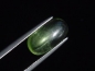 Preview: Peridot cat's eye 5,35 Ct. - apple green - oval cabochon