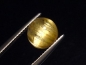 Preview: Rutile Quartz cat's eye 4,19 Ct. round cabochon - Minas Gerais, Brazil