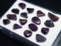 Preview: Sugilith Trommelsteine Lot in Box - Wessels mine, Kuruman, Südafrika