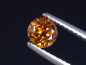 Preview: Spessartit Granat 0,58 Ct. leuchtend orange 5 mm Rund Tansania