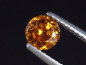 Preview: Spessartit Granat 0,68 Ct. leuchtend orange 5 mm Rund Tansania