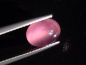Preview: Rhodochrosit Katzenauge 2,78 Ct. Oval Cabochon - Kuruman, Südafrika