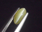 Preview: Chrysoberyll Katzenauge 0,58 Ct. Oval Cabochon B-Qualität