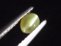 Preview: Chrysoberyll Katzenauge 0,42 Ct. Oval Cabochon B-Qualität