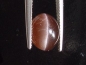 Preview: Scapolite Catseye 4,91 Ct. brown cabochon Madag.