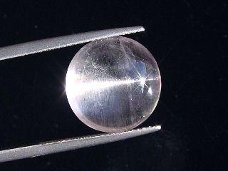 Skapolite cat's eye 10,22 Ct. colorless round cabochon Tanzania