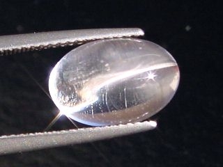 Skapolite cat's eye 5,94 Ct. colorless oval cabochon Tanzania