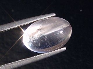 Skapolite cat's eye 5,94 Ct. colorless oval cabochon Tanzania