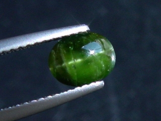 Kornerupine cat's eye 1,28 Ct. oval cabochon Sri Lanka