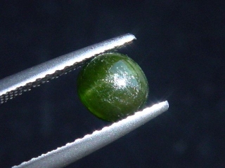 Kornerupine cat's eye 1,11 Ct. round cabochon Sri Lanka