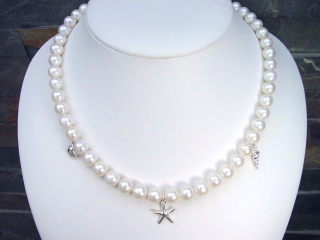 Perlenkette mit maritimen Elementen aus Silber 253,30 Ct. Muschel und Seestern 47 - 50 cm